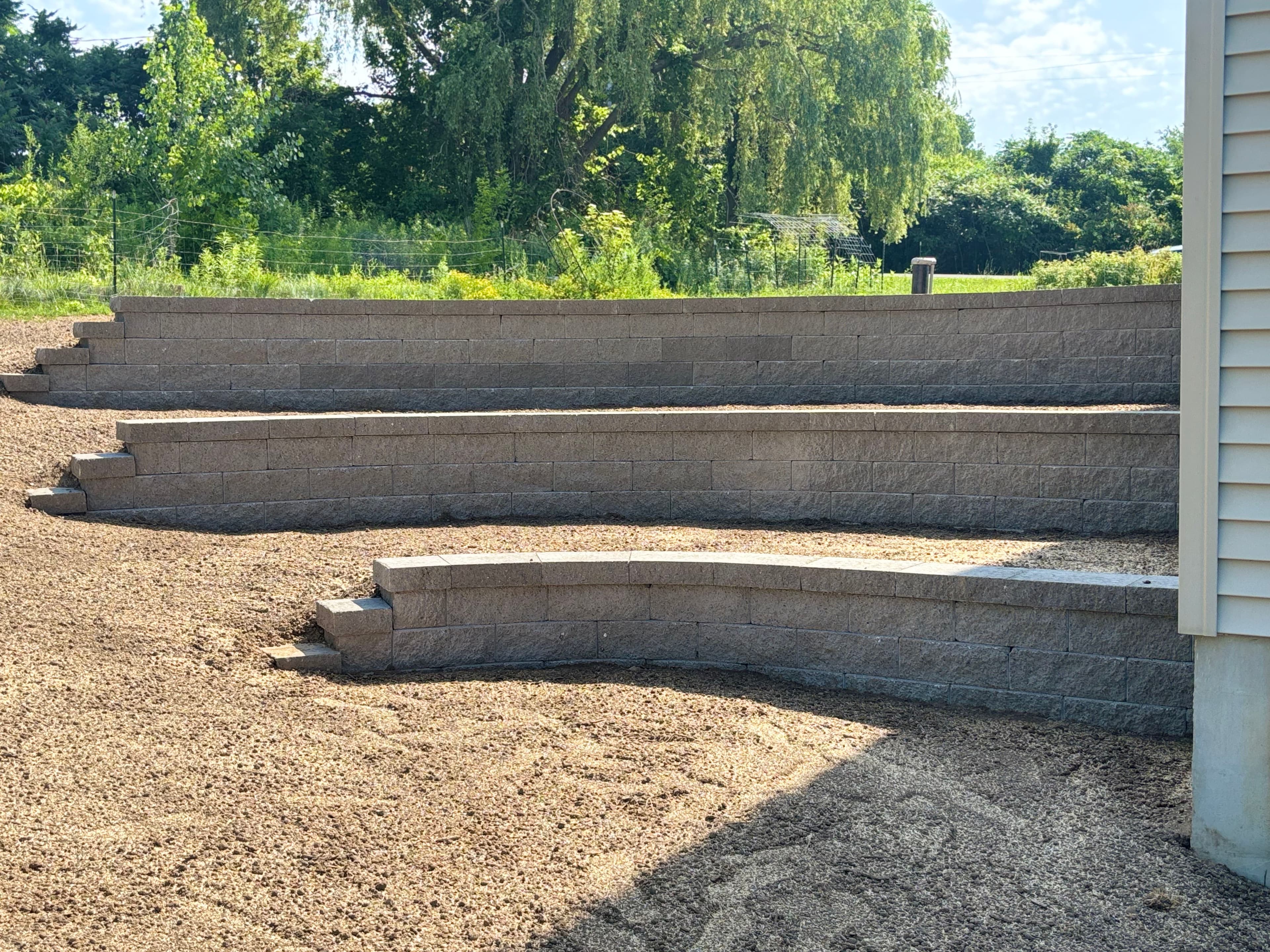 Project Multi-Tier Versa-Lok Retaining Walls That Put a Sloped Backyard to Work image