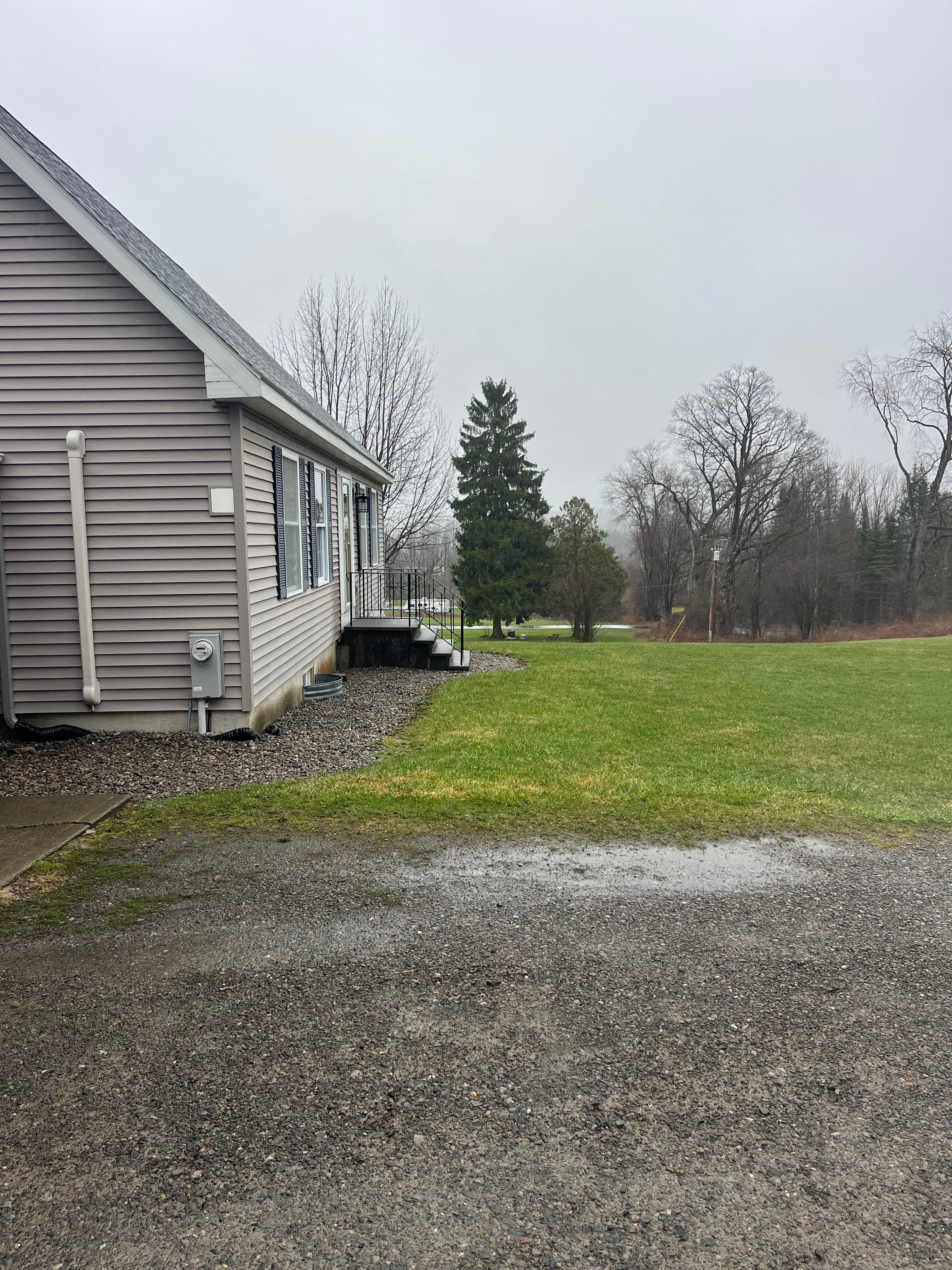 Project Muddy Gravel Entrance Gets a Solid Poured Concrete Walkway image