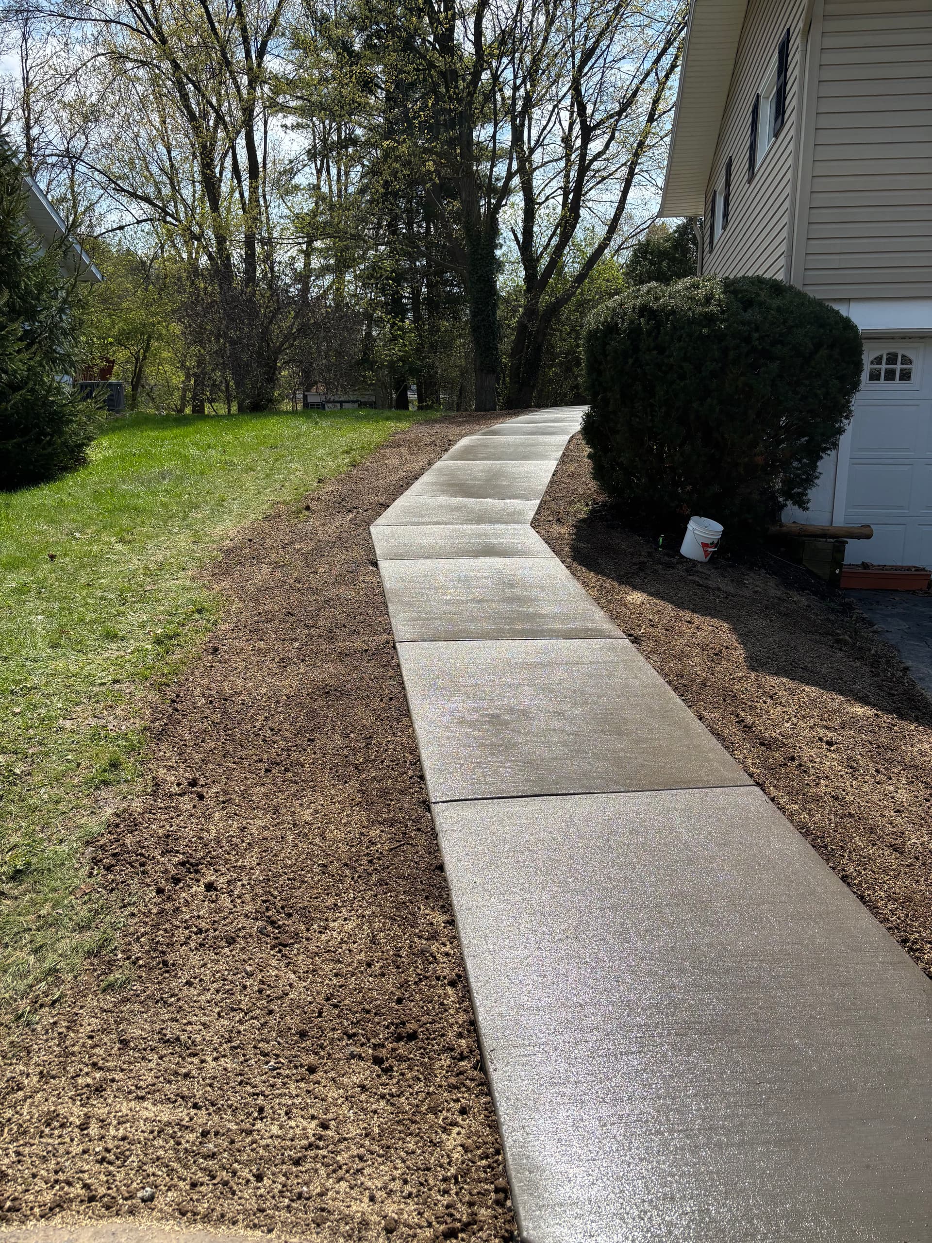 New concrete sidewalk makes home access safer and easier image